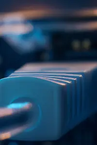 KI-generiertes Bild - Network plug glowing blue