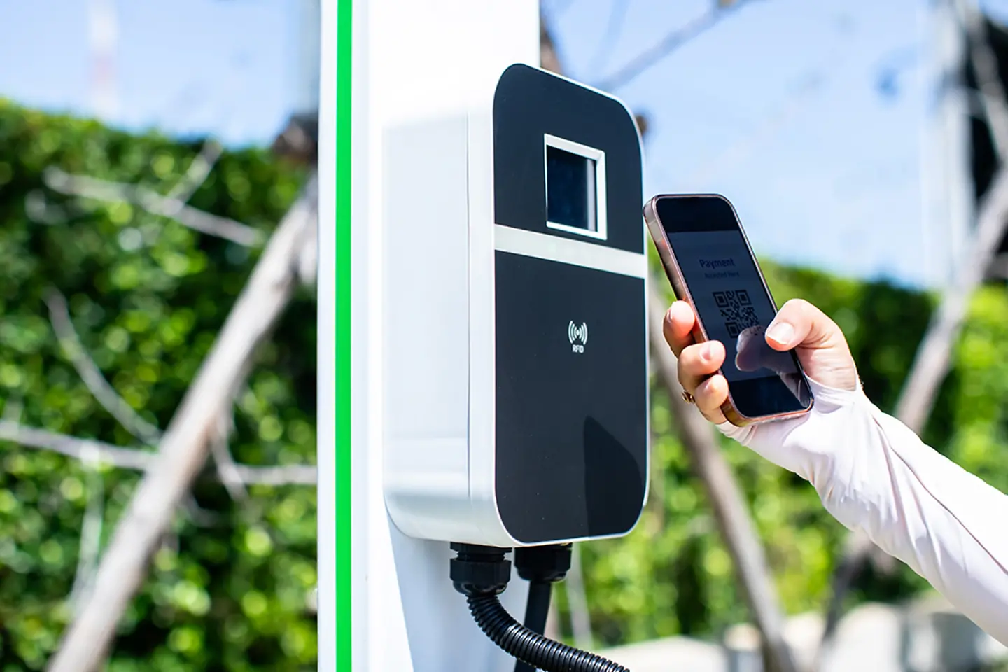 EV driver uses smartphone to scan QR code