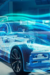 Engineer Wearing Augmented Reality Headset Working on New Electric Car Chassis Platform.