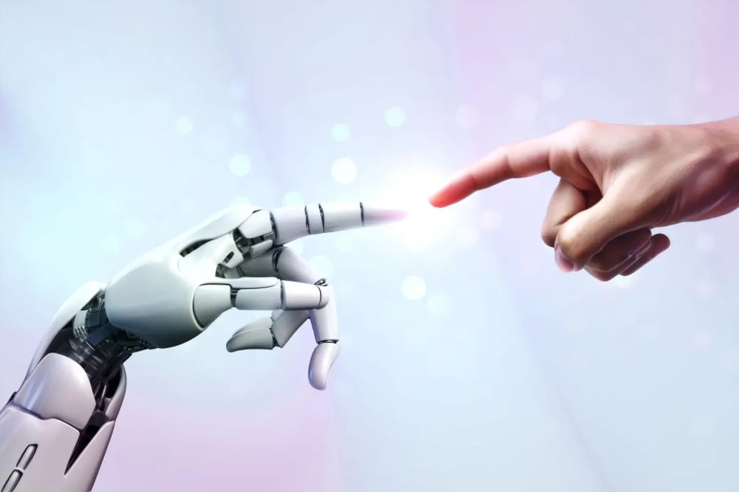 Robot and human hands are touching and connecting.