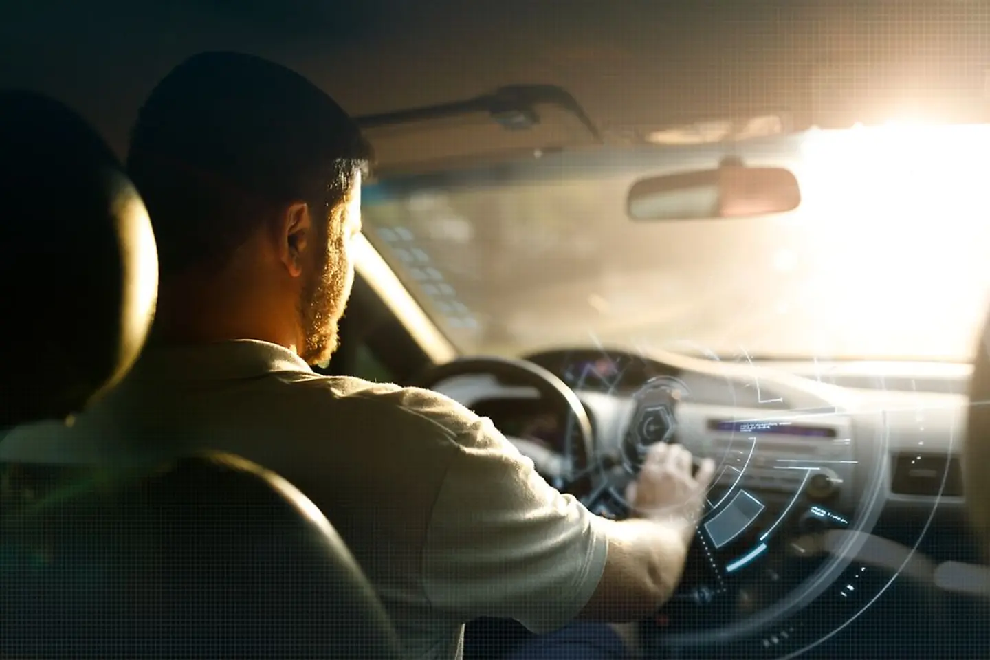 Male driver driving a car